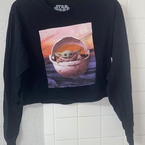 Baby yoda image onto a cropped long sleeve shirt